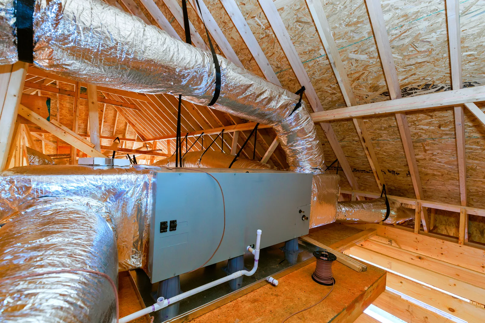 Metal HVAC air ducts in a residential ceiling