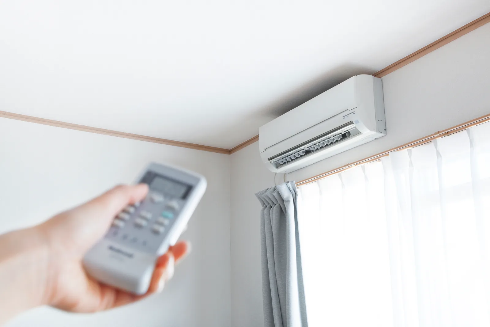 HVAC technician servicing indoor cooling equipment
